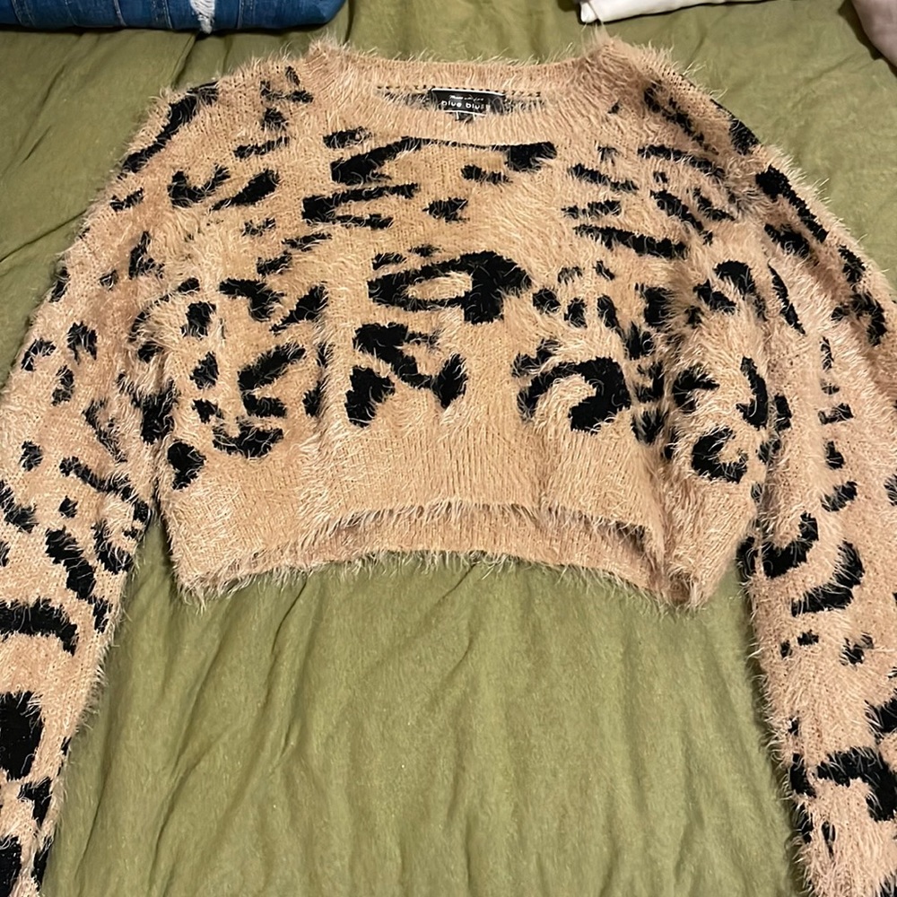Cropped fuzzy cheetah sweater.